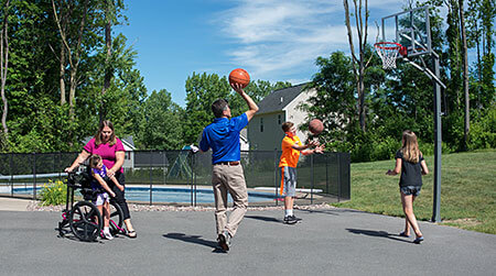 Family playing basketball