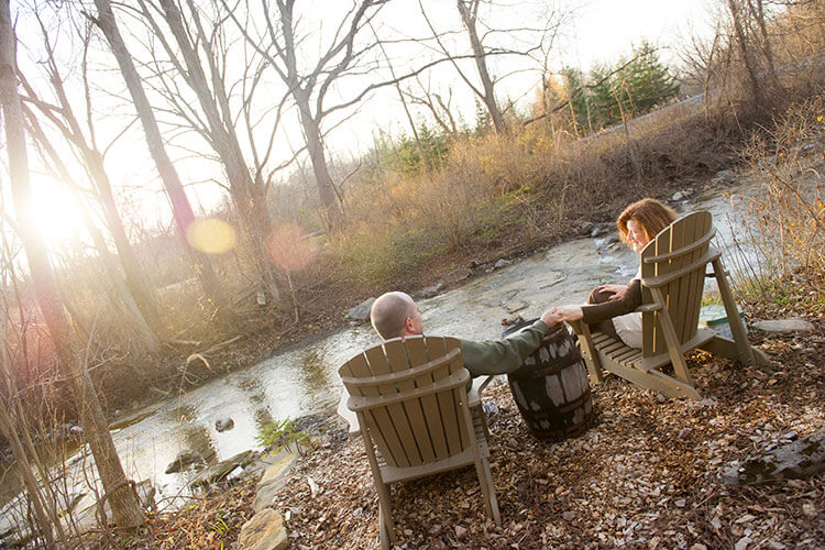 Couple relaxing by the river